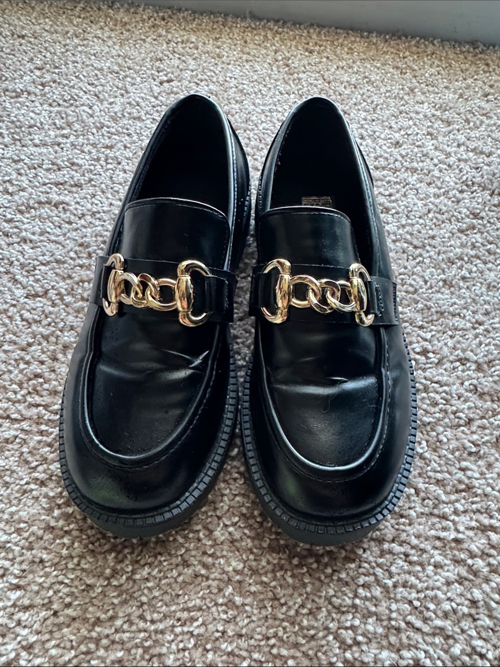 Women’s Black Leather Loafers with Gold Chain Accent